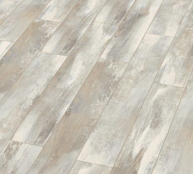 Un primer plano de un piso de madera blanco y gris.