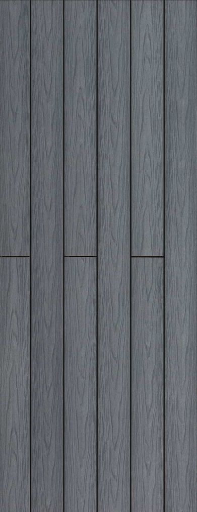 Un primer plano de un piso de madera gris con una textura sin costuras.