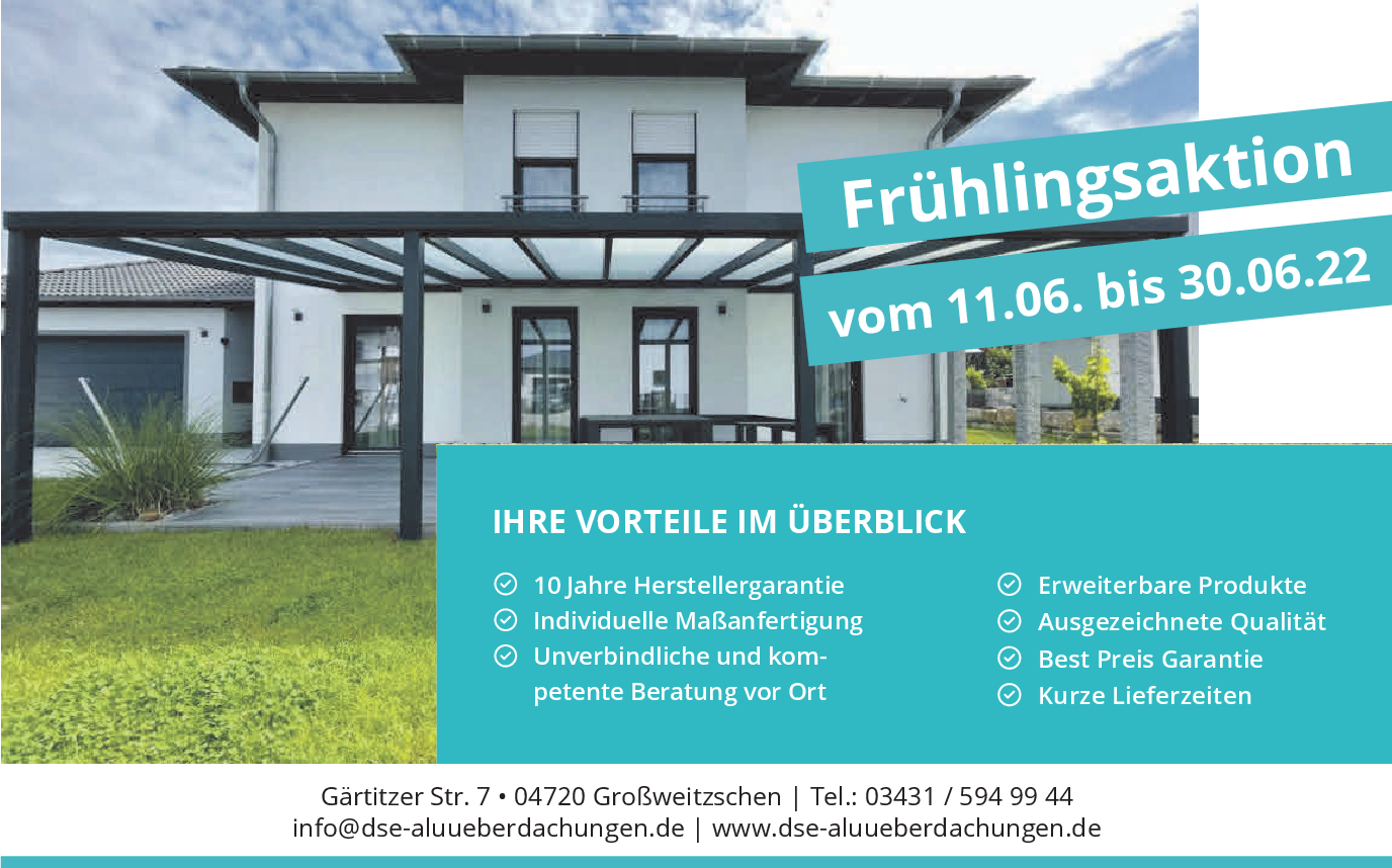 Ein weißes Haus mit einem blauen Schild mit der Aufschrift „Frühlingsaktion“