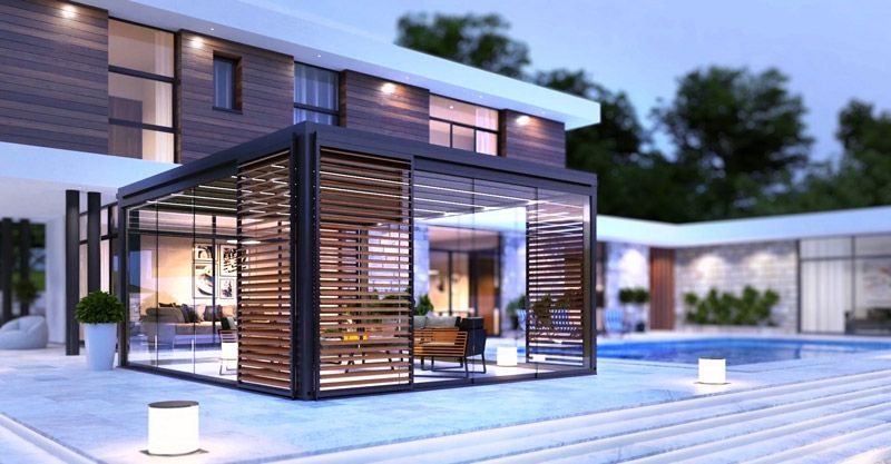 Ein modernes Haus mit Swimmingpool und Pergola davor.