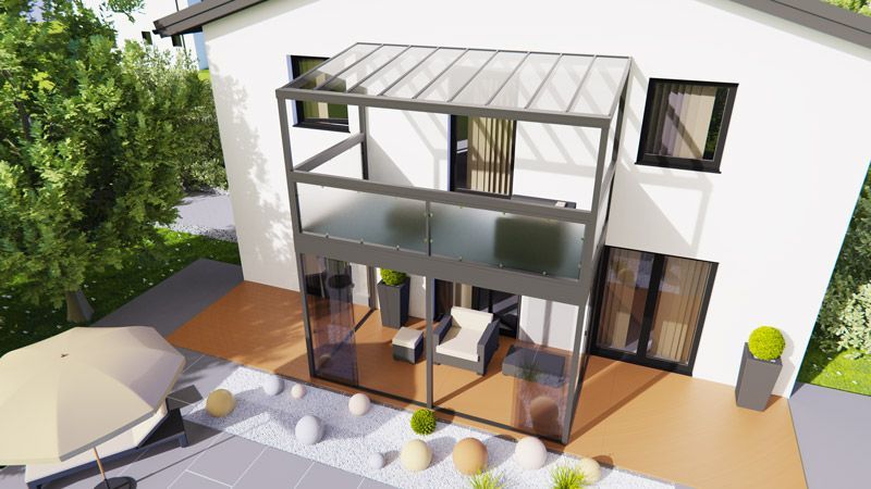 Eine Luftaufnahme eines Hauses mit Balkon und Terrasse.