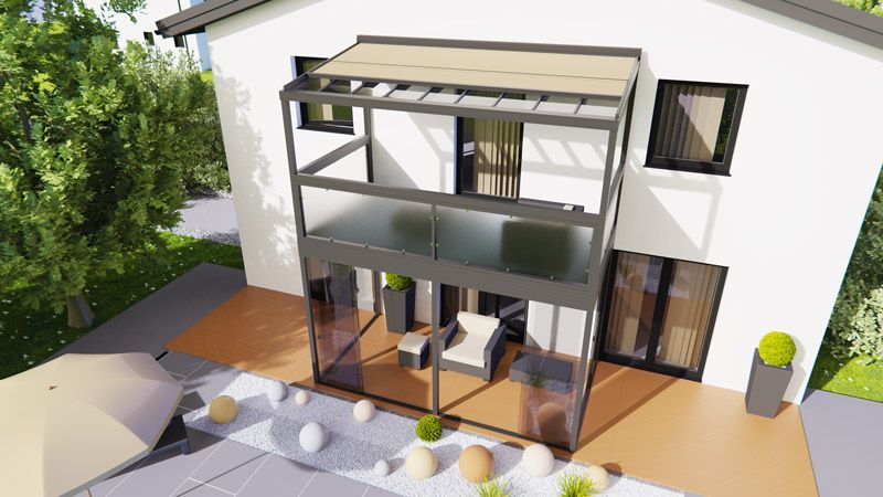 Eine Luftaufnahme eines Hauses mit Balkon und Terrasse.