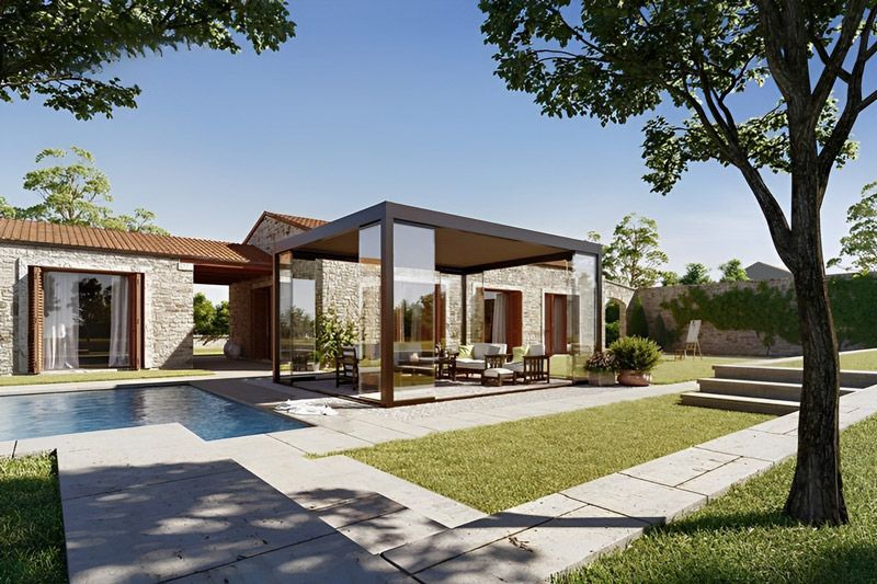 Ein Haus mit Swimmingpool und einer Pergola davor.