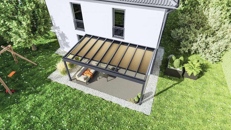 Eine Luftaufnahme eines Hauses mit einer Pergola im Hinterhof.