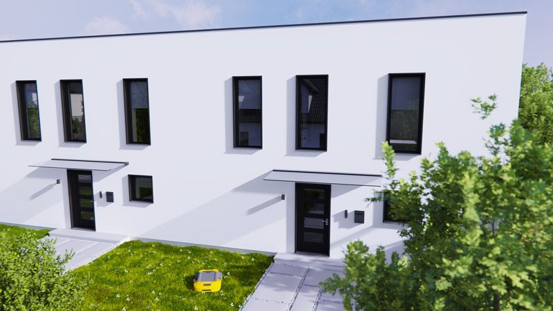 Ein weißes Gebäude mit schwarzen Fenstern und einem gelben Briefkasten davor.