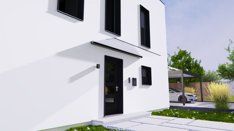 Ein weißes Haus mit einem davor geparkten Auto