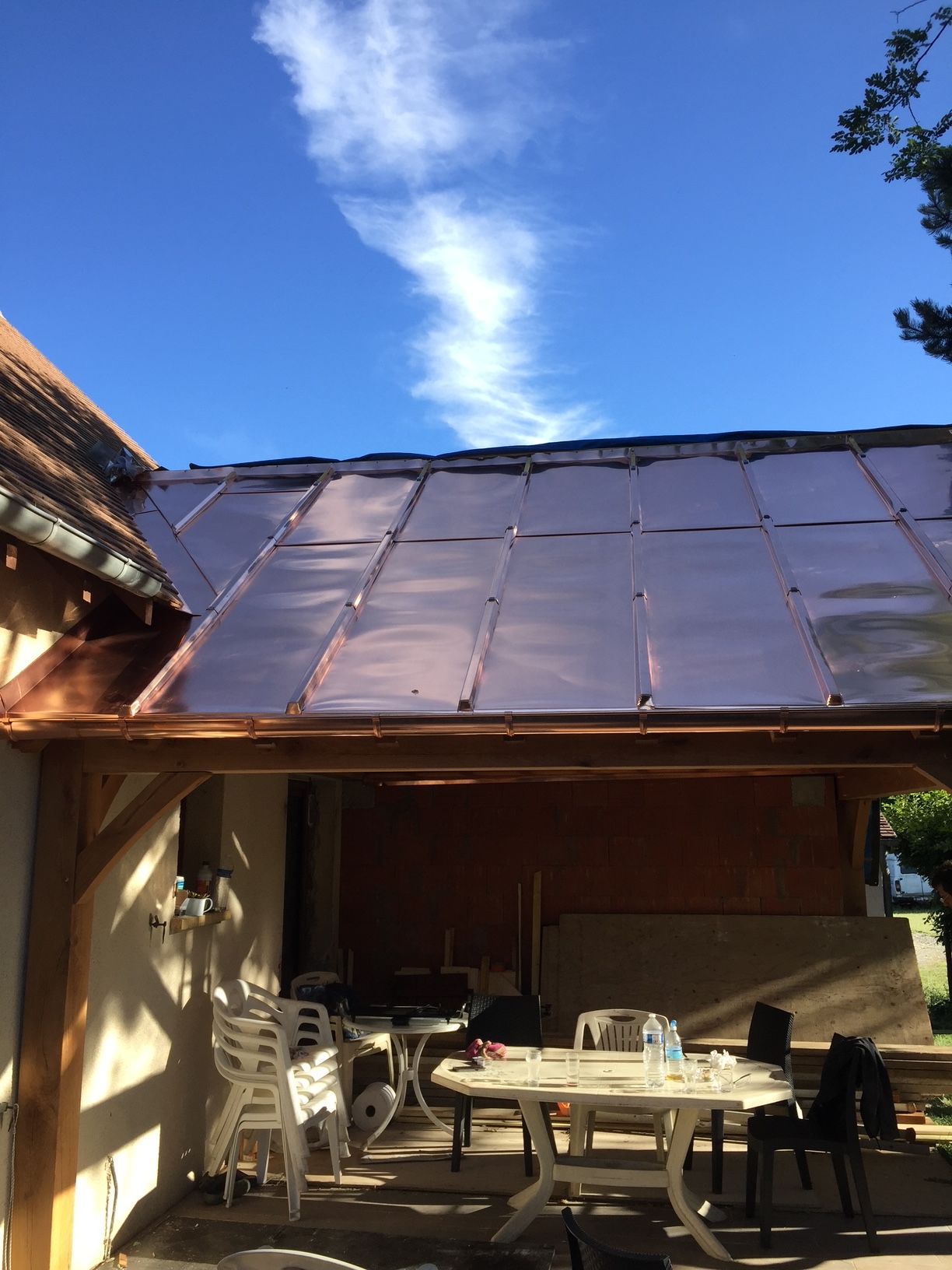 Chantier finalisé pour l'agrandissement d'une charpente et une couverture en cuivre