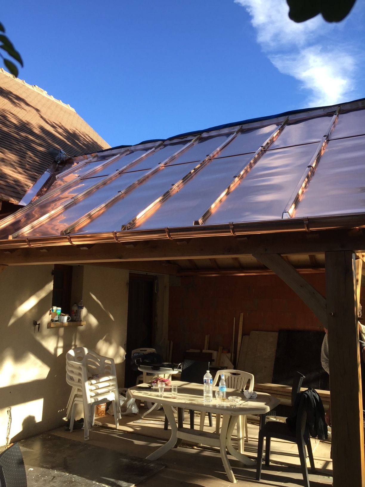 Agrandissement terminé pour une charpente et sa couverture en maison individuelle