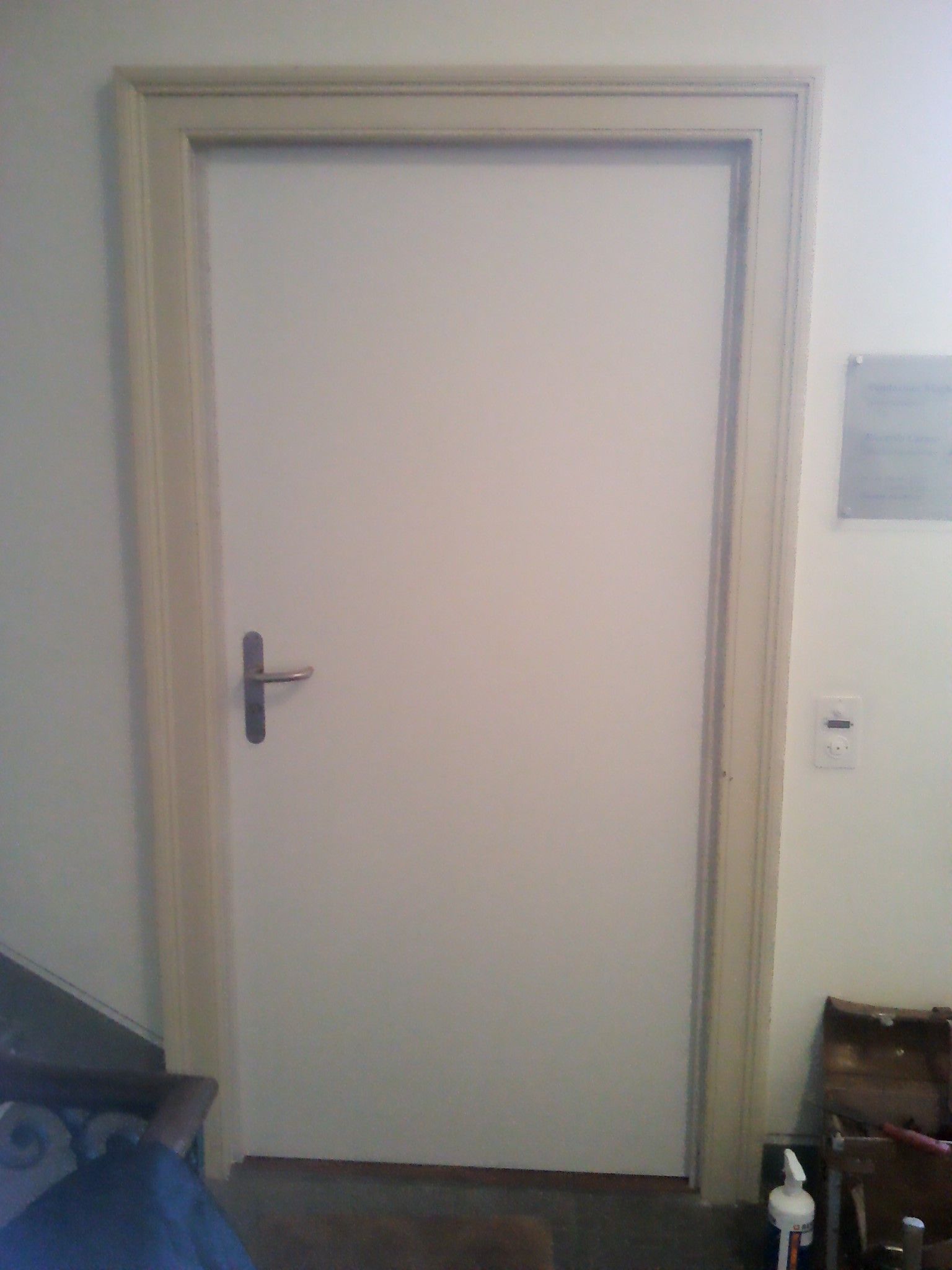 nuova porta EI30 antifuoco con recupero porta esistente a 2 ante (durante la lavorazione)