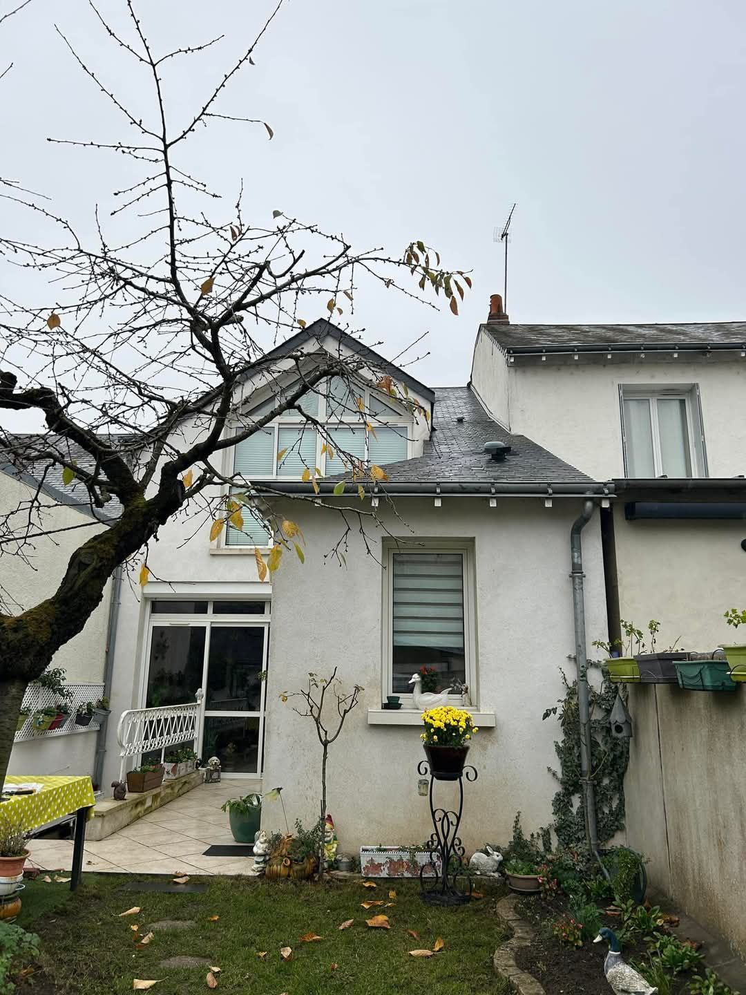 Surélévation d'une maison avec une véranda