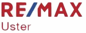 RE/MAX Uster-Logo mit rotem Text und blauem Streifen.