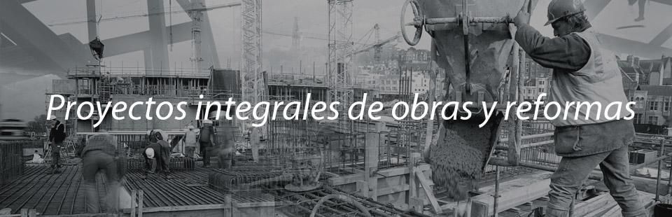 Obreros de la construcción en una obra, el texto dice