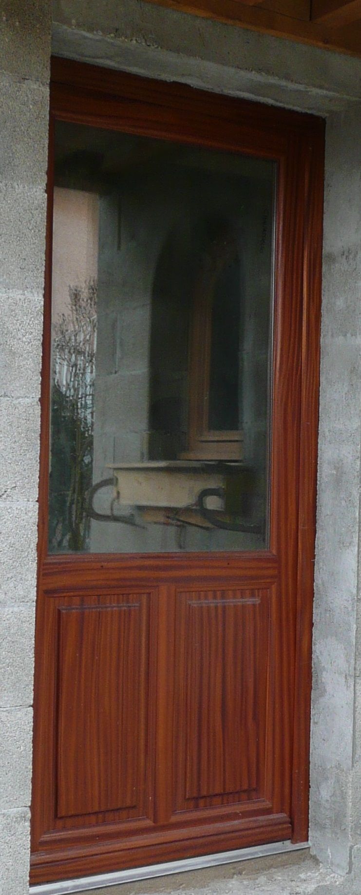 Pose d'une porte fenêtre - menuiserie