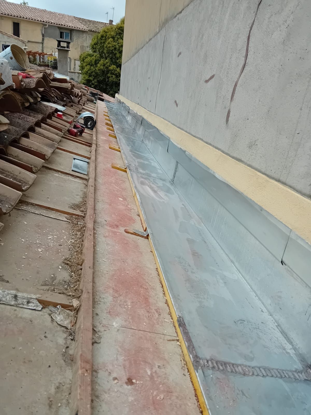 Chéneau en cours de pose