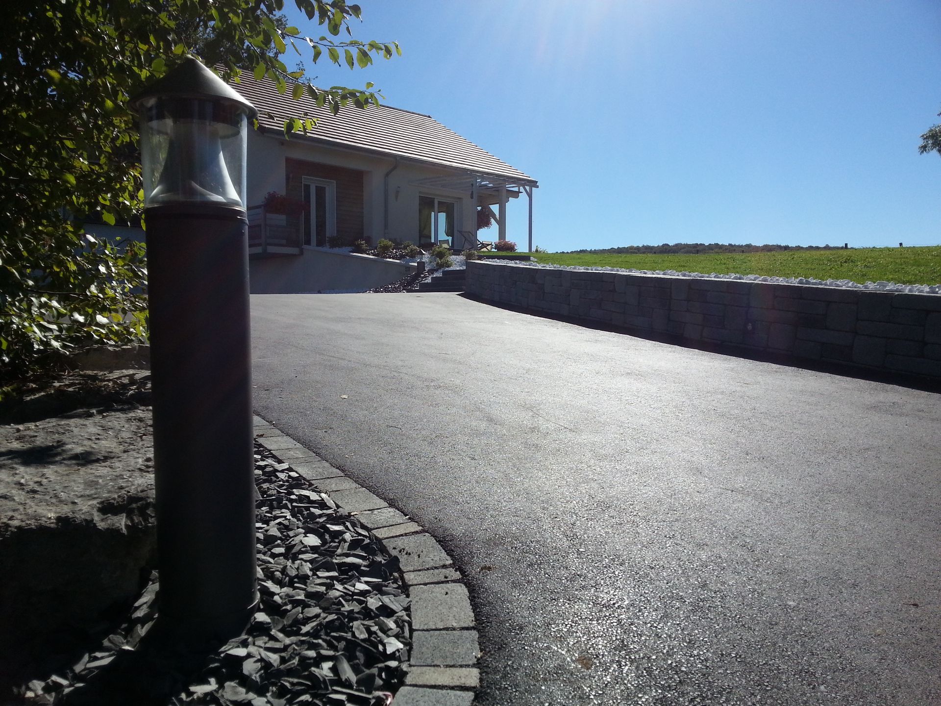 Photo d'une clôture en pierre réalisée par Les Jardins d'Adam