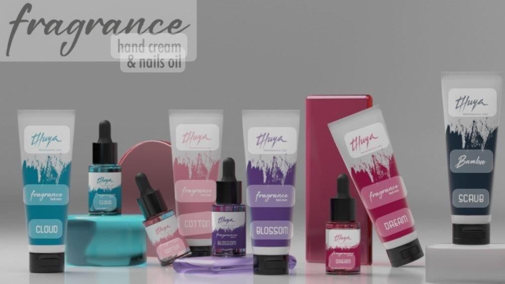 Una variedad de productos de fragancias están alineados en una mesa.