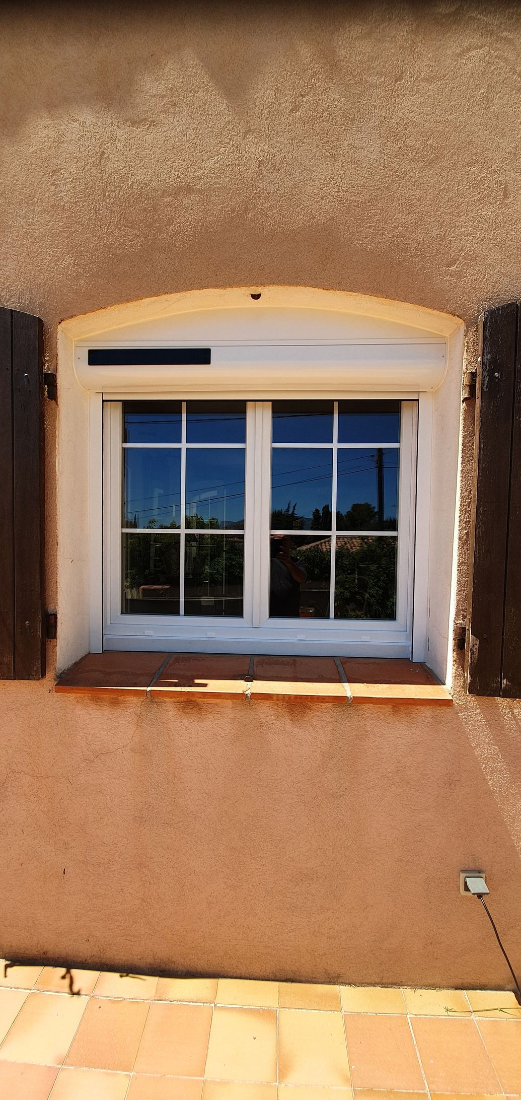 Fenêtre avec volets roulants