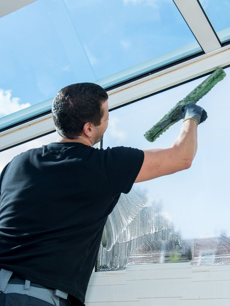 Technicien pour nettoyage de vitres
