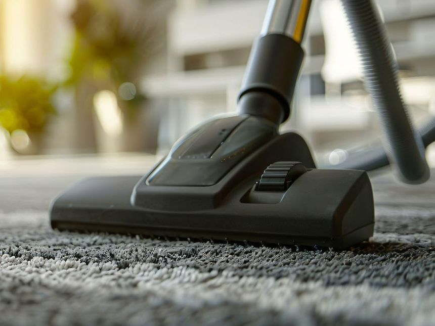 Aspirateur sur un tapis