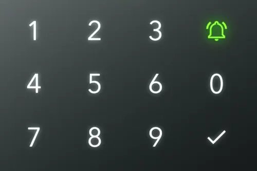 Tastatur mit leuchtend weißen Zahlen und einem grünen Glockensymbol.
