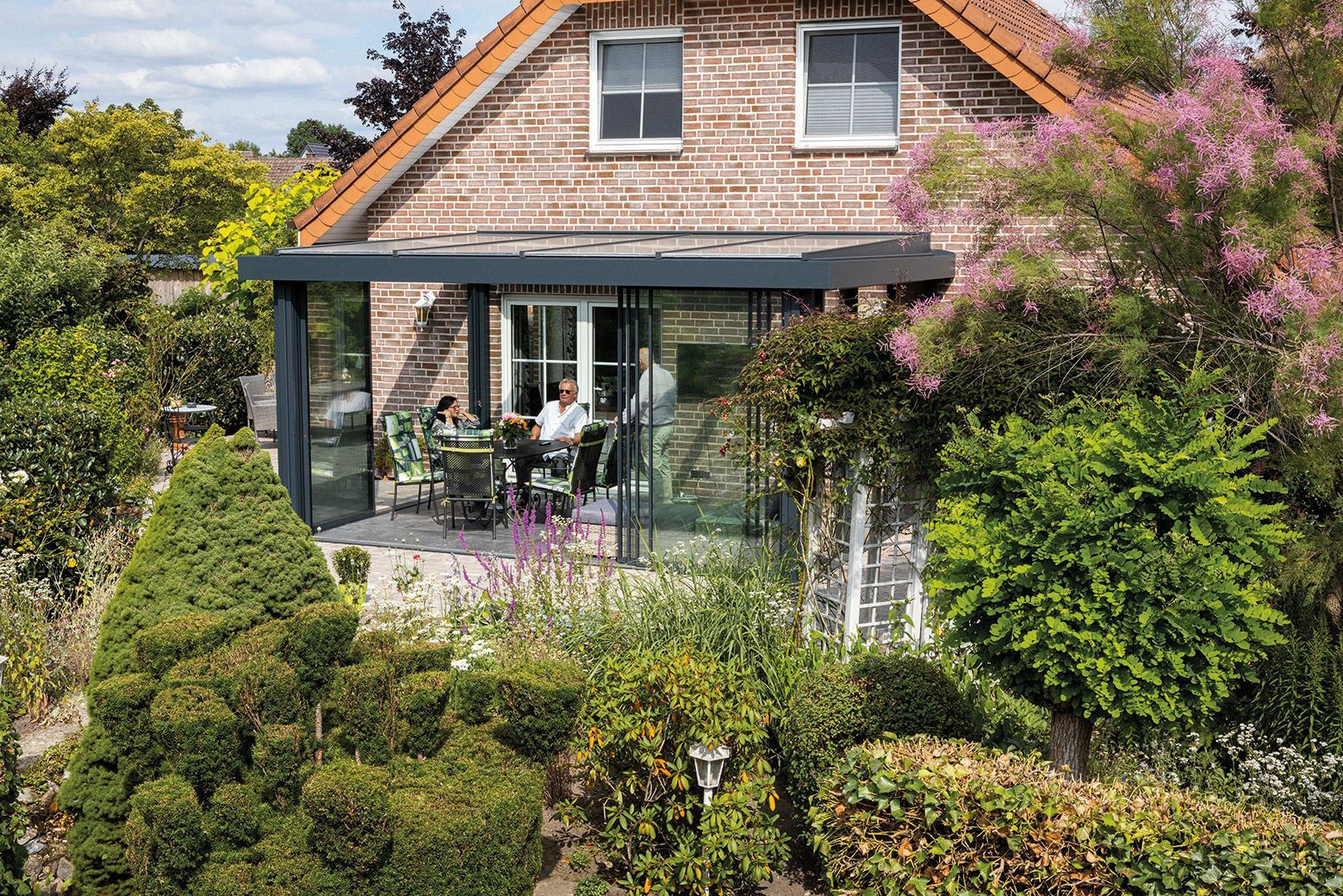 Wintergarten mit offener Glastür