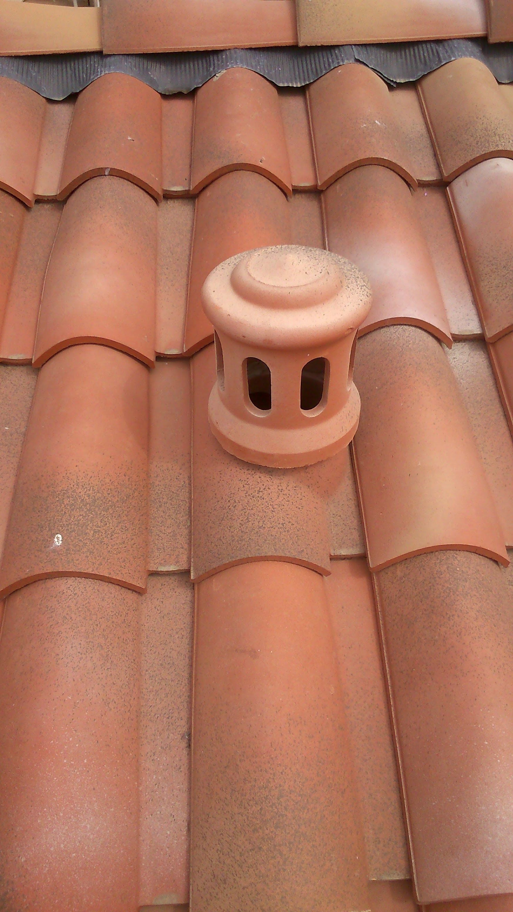 Couverture avec une bouche d'aération