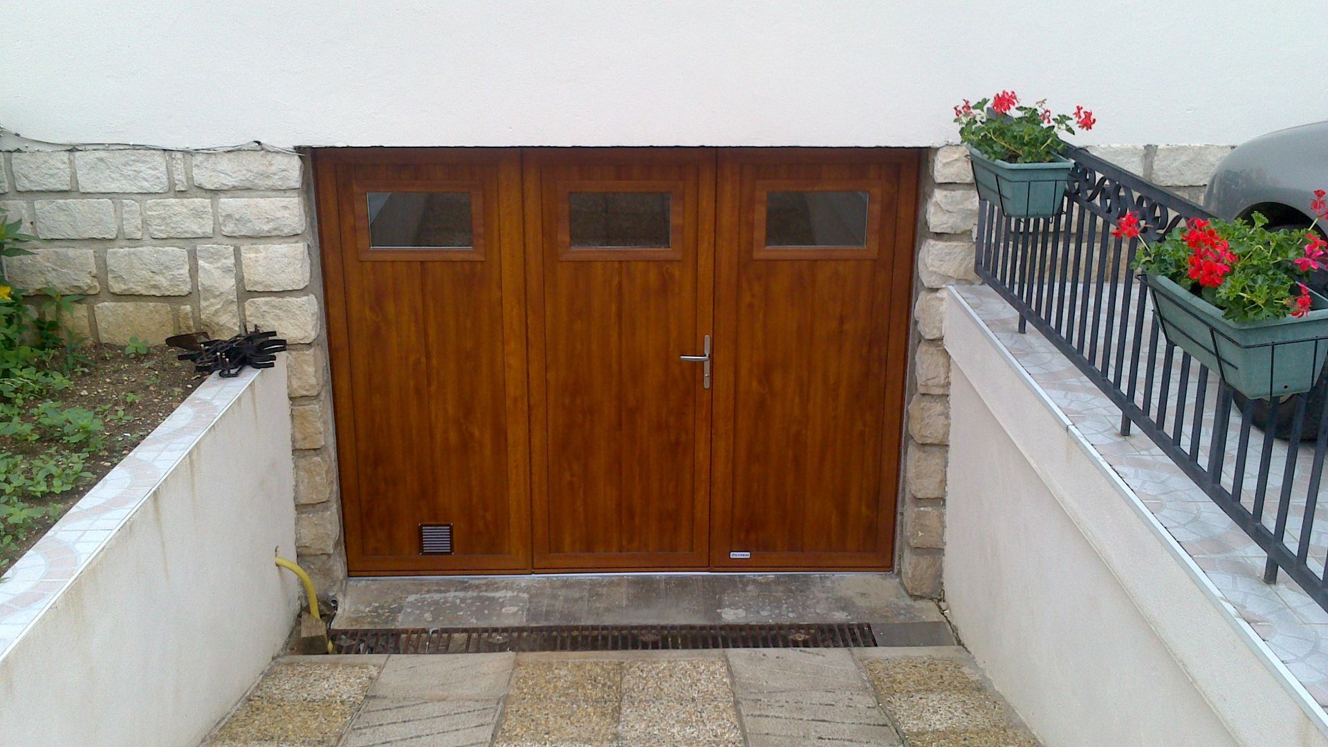 Porte de garage pliante en bois