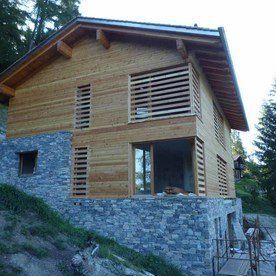 Melly Raphy SA - pose de laine en verre