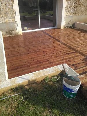 Chantier 3, terrasse bois après travaux, vue baie coulissante