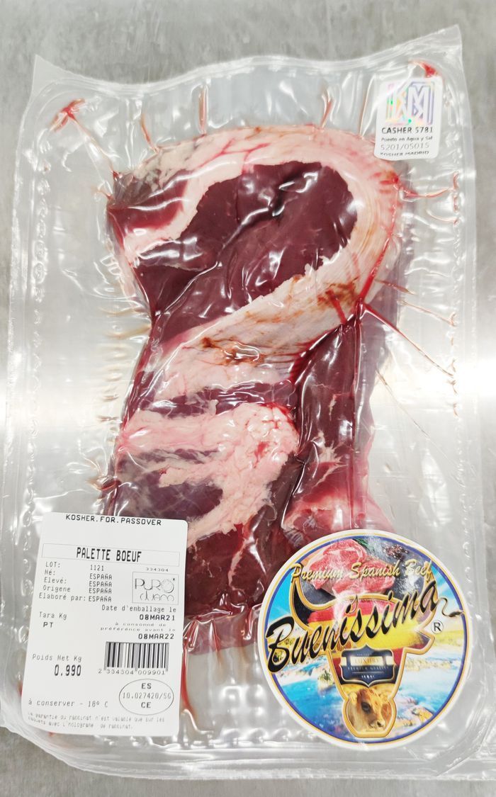 Un trozo de carne está en una bolsa de plástico con una etiqueta.
