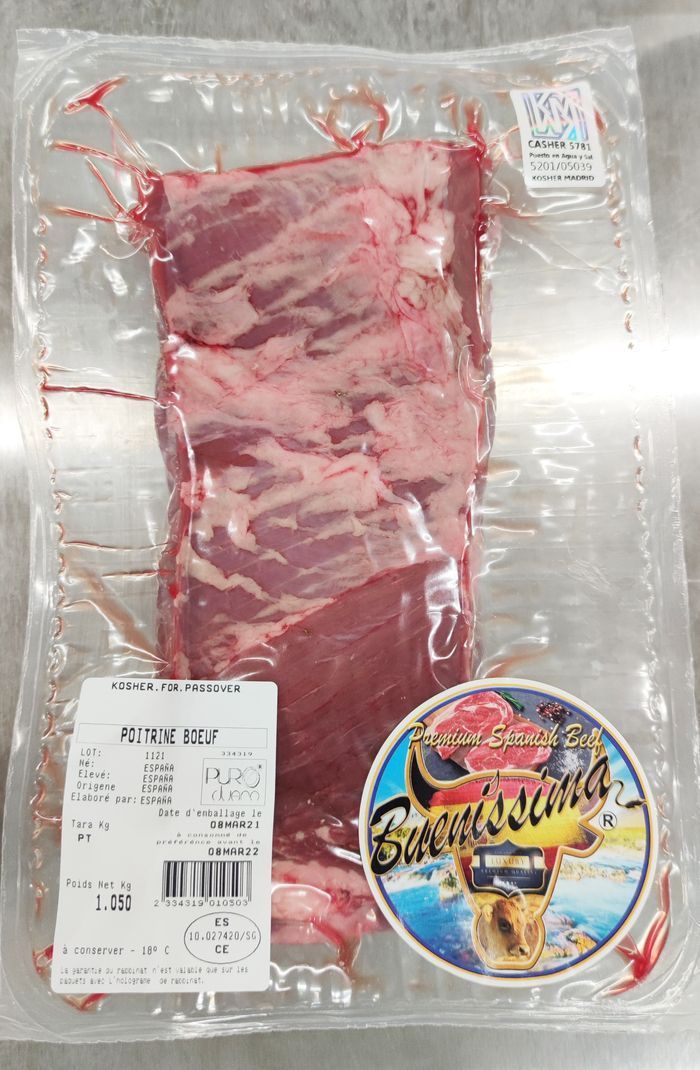 Un paquete de carne cruda con una etiqueta que dice 'filete'