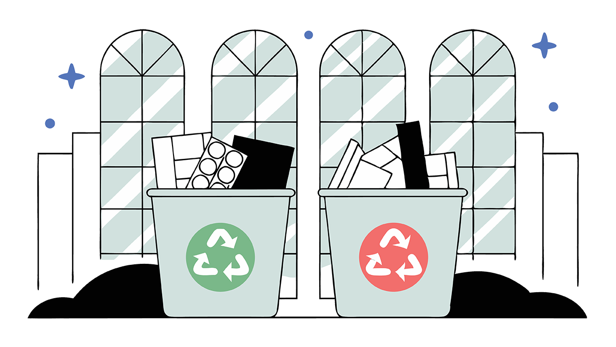 Deux poubelles de recyclage : une verte, une rouge devant une fenêtre.