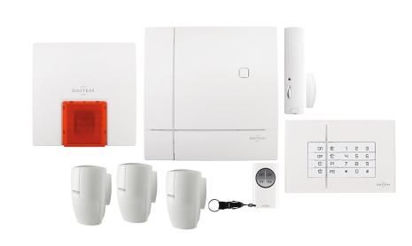 Composants du système de sécurité domestique blanc : sirène, panneau de commande, clavier, détecteurs de mouvement et télécommande.