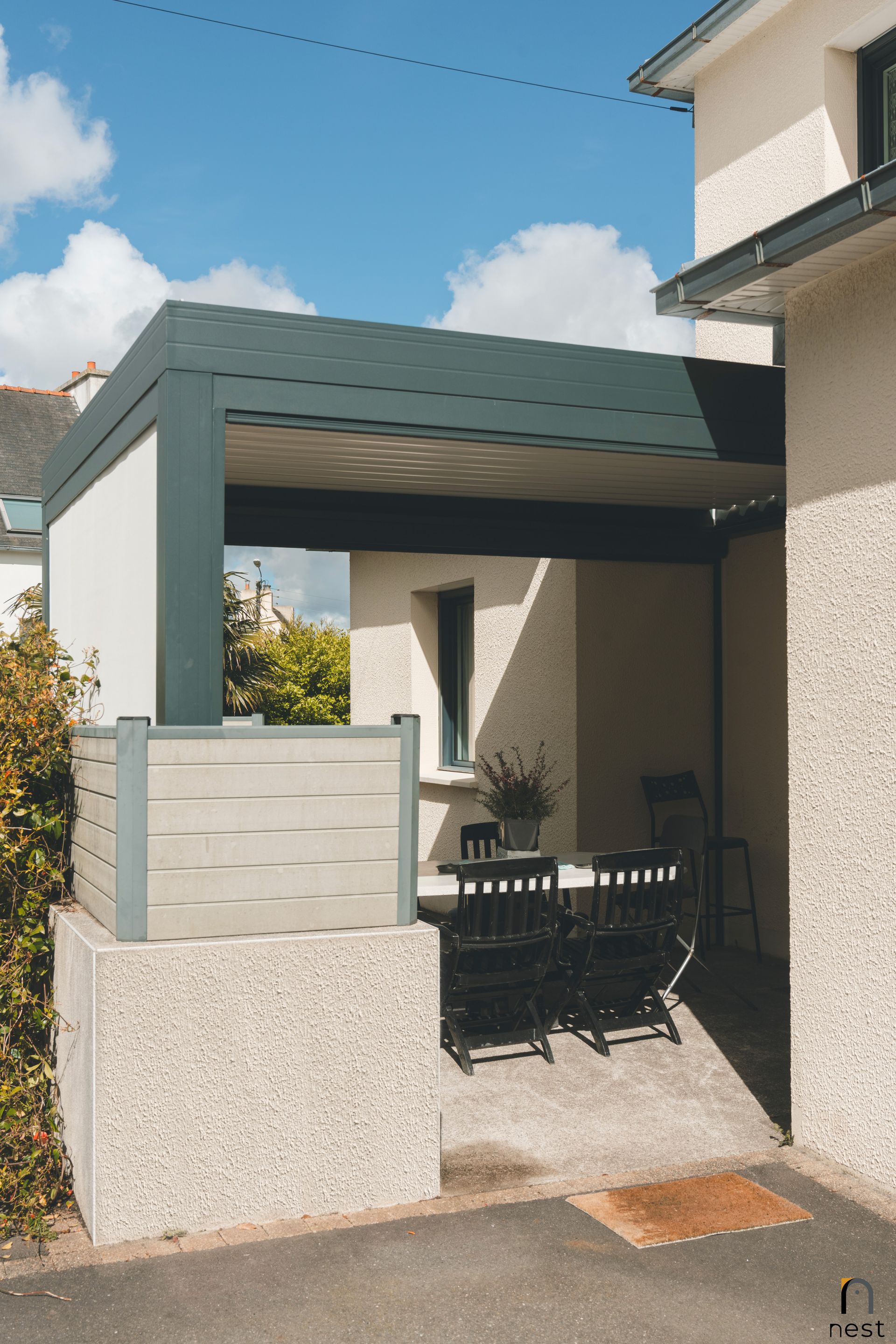 Terrasse d'une maison avec pergola