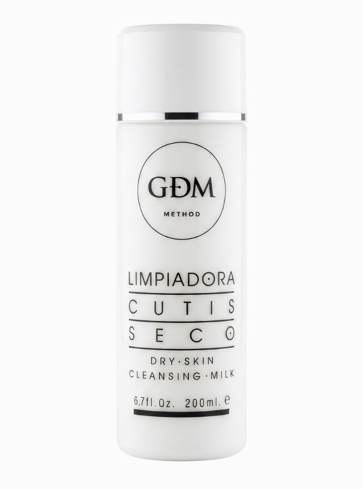 Botella blanca de leche micelar desintoxicante GDM con texto negro sobre fondo liso.