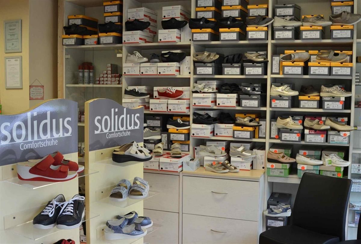 Ein Geschäft mit einem Schild mit der Aufschrift „Solidus“ darauf