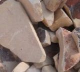 Ein Stapel Steine, die übereinander liegen. Foto von der Dr. Ludwig GmbH