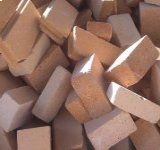 Ein Stapel brauner und weißer Ziegel, die übereinander gestapelt sind. Foto von der Dr. Ludwig GmbH