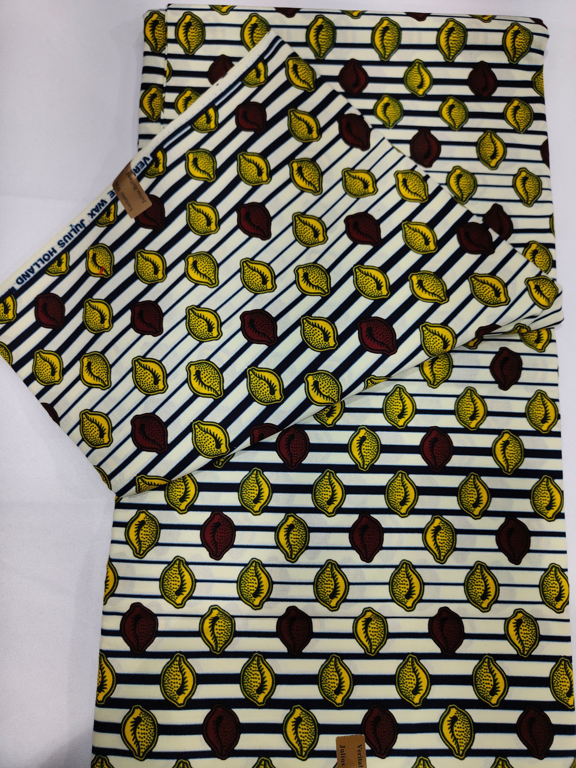 Tissu rayé motifs coquillages jaunes et marrons