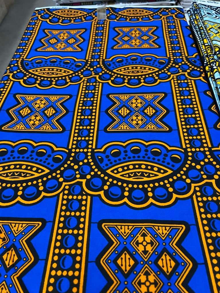 Tissu motif orange sur fond bleu