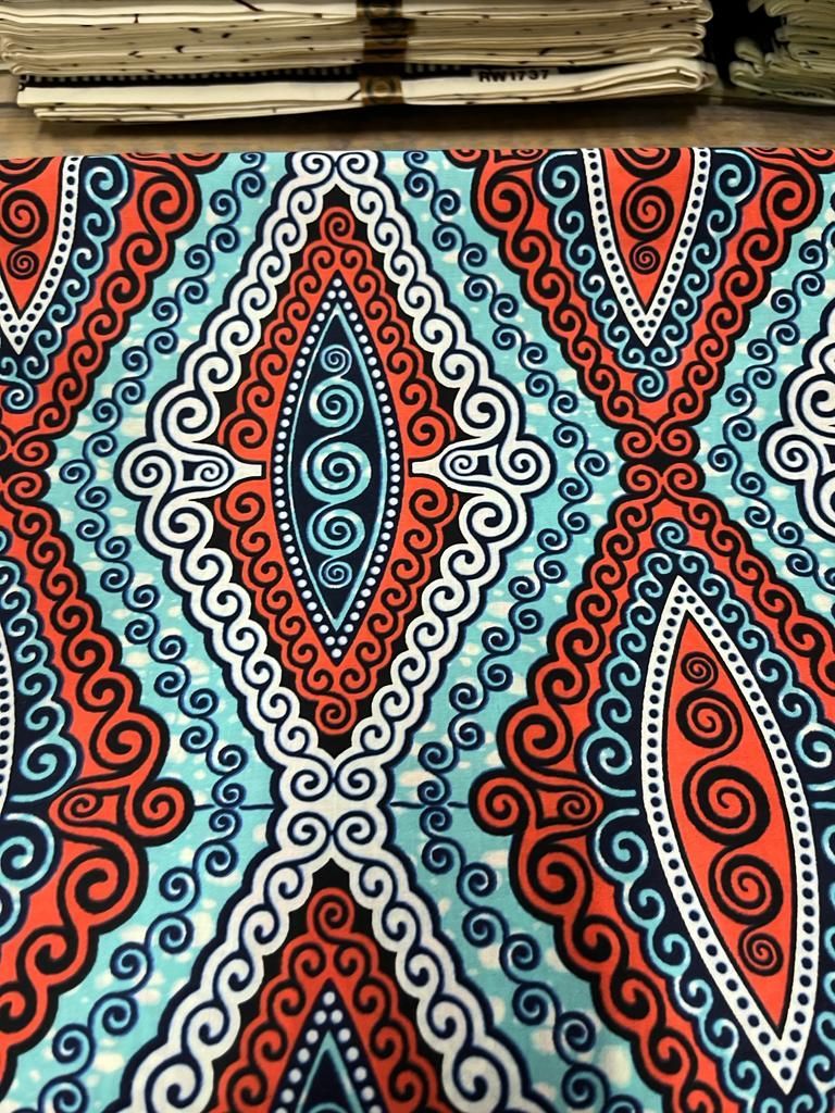 Tissu motif arrondi blanc, bleu et orange