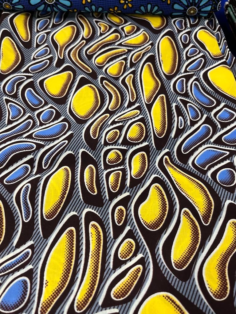 Tissu motif avec effet de profondeur jaune et bleu