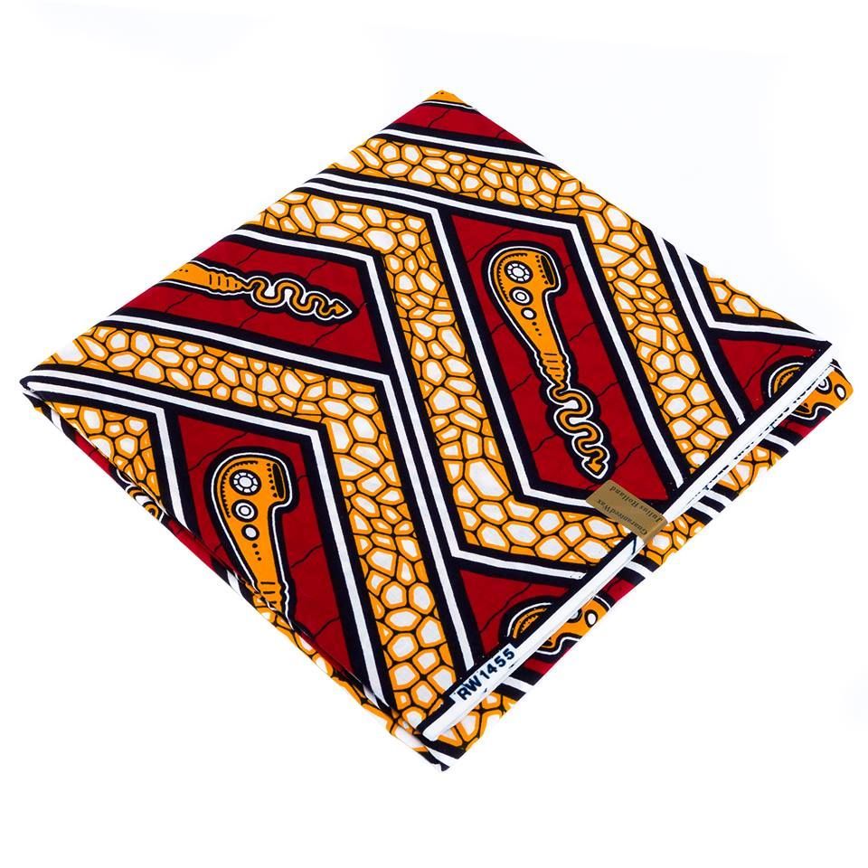 Tissu avec forme géométrique rouge et orange