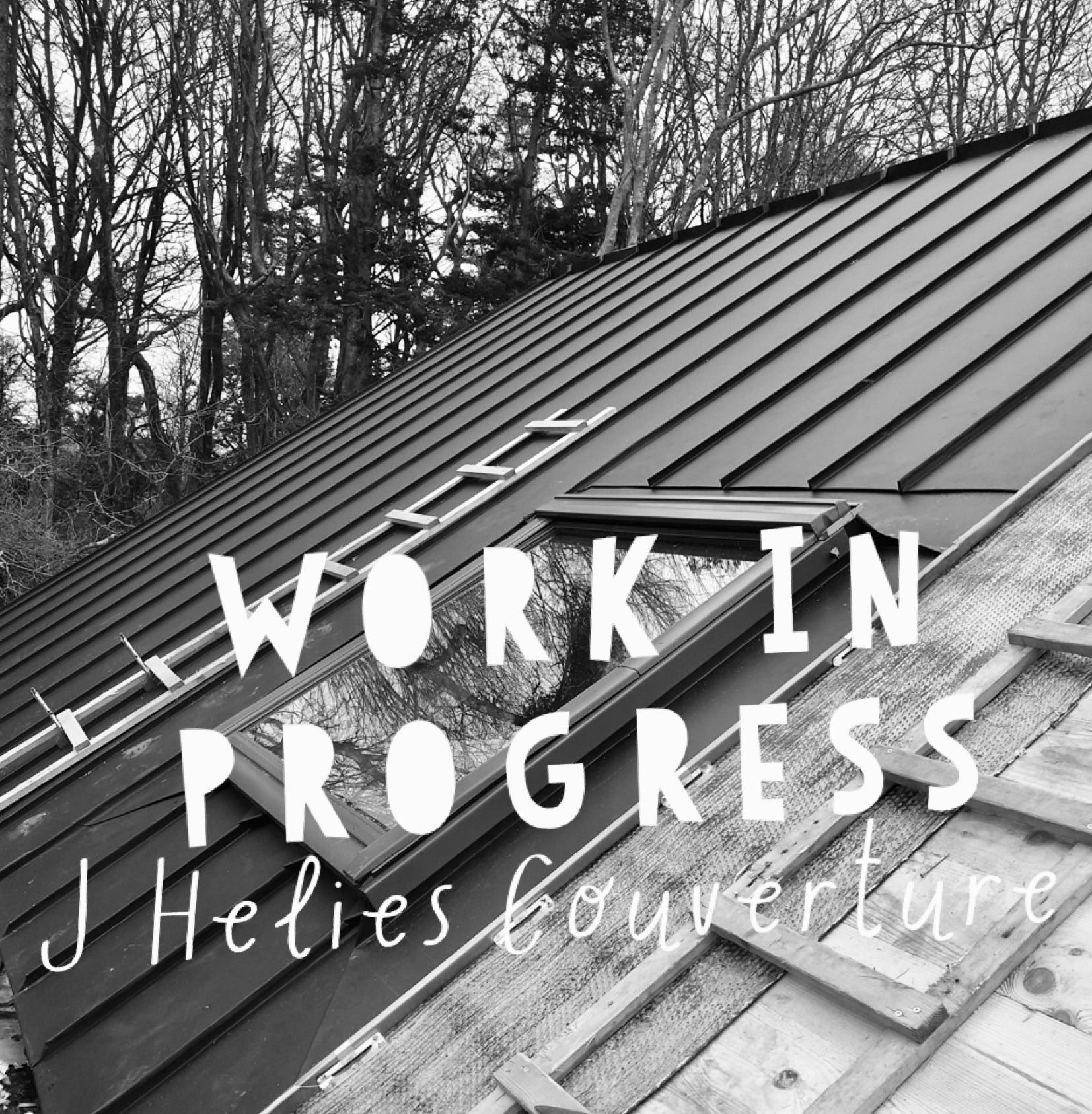 Rénovation toiture avec fenêtre de toit