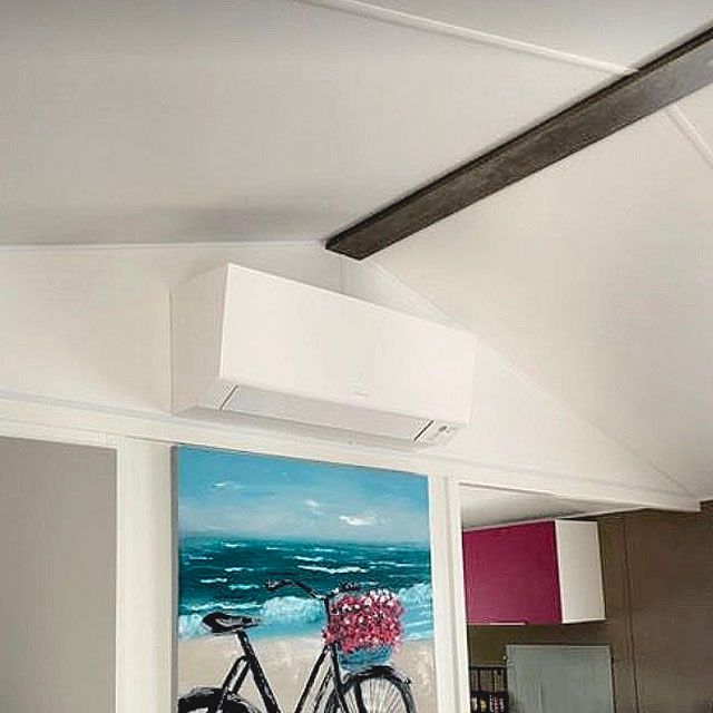 Climatisation murale réversible dans un appartement neuf par FIEVRE Frères.