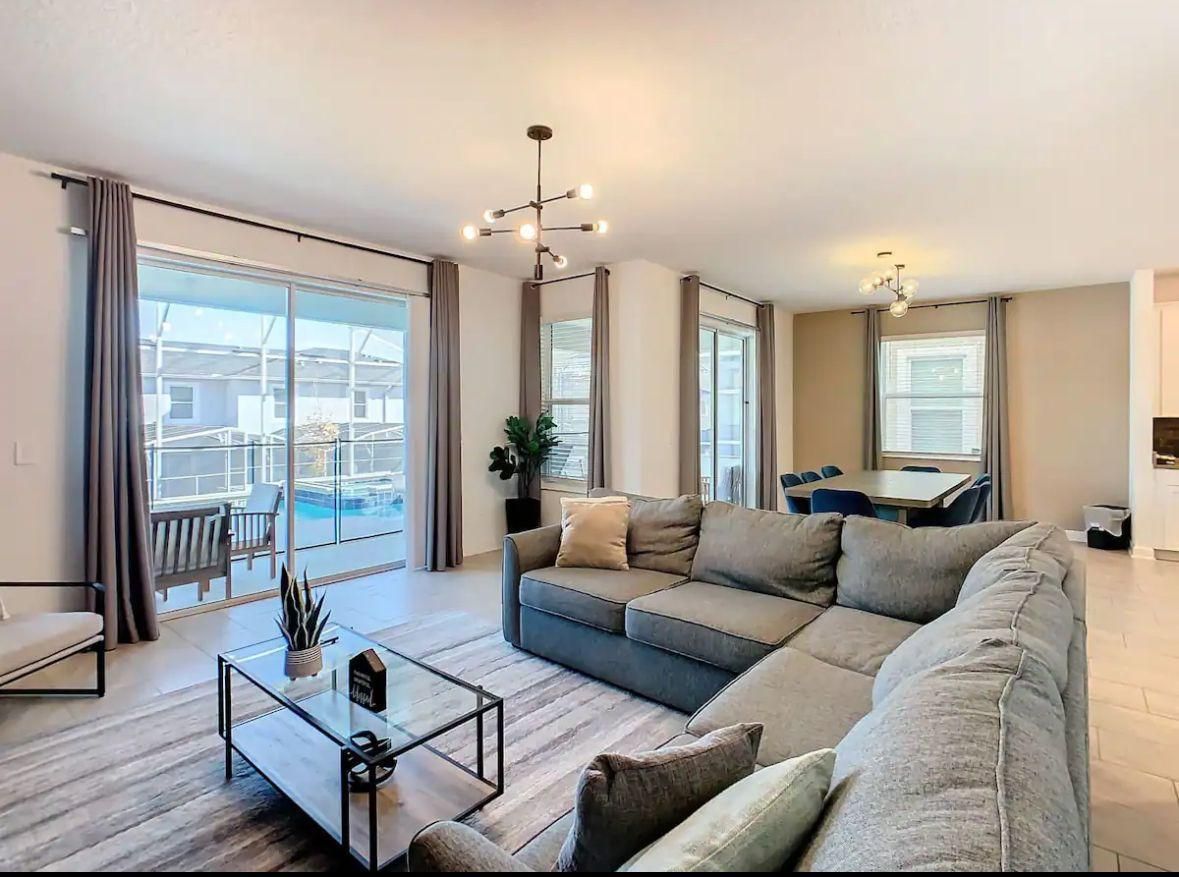 A living room with a couch and a coffee table