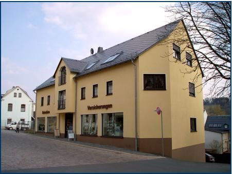 Sonntag Hoch- und Ausbau GmbH Gelbes Mehrfamilienhaus