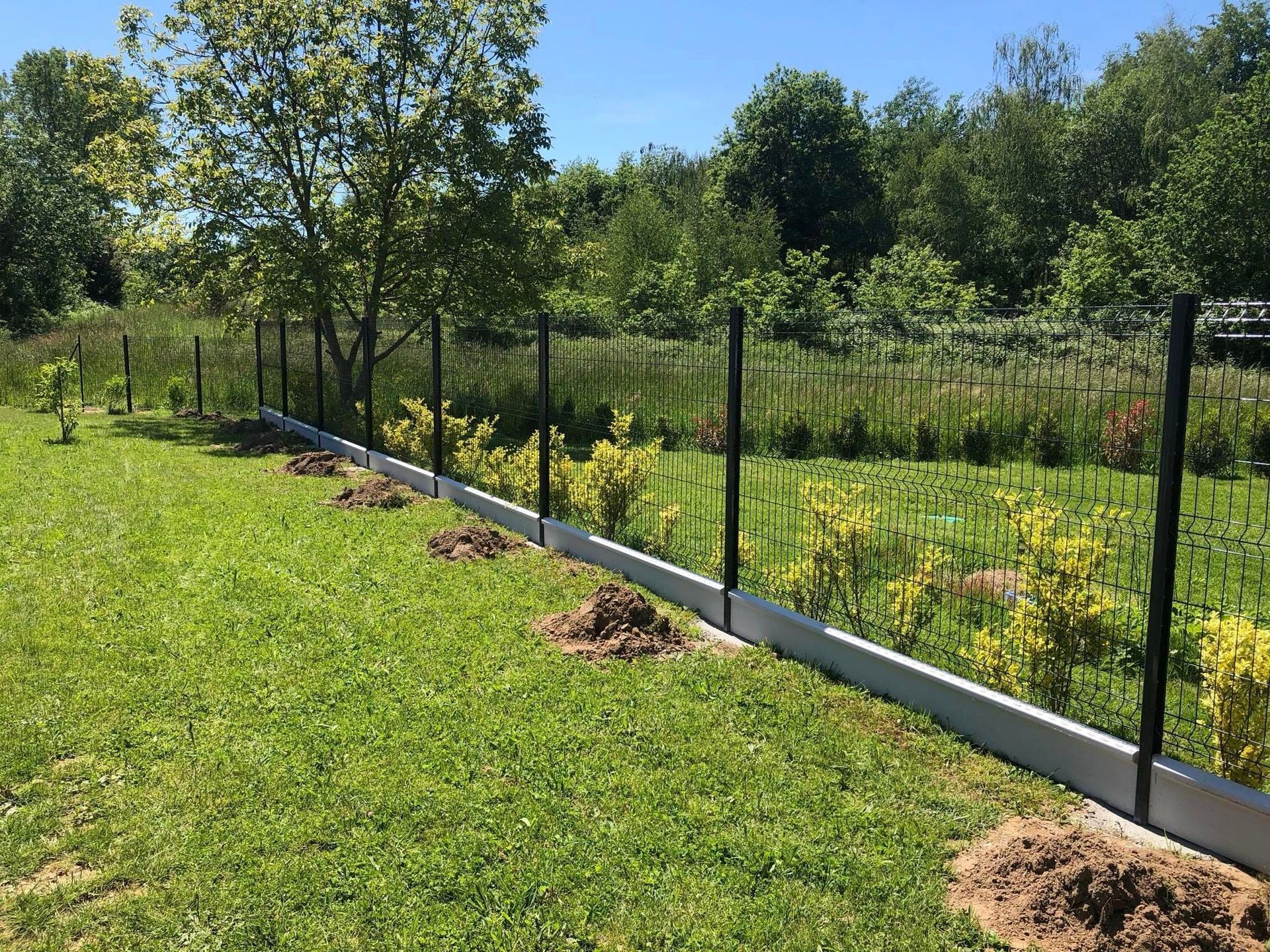 Pose de grillage rigide