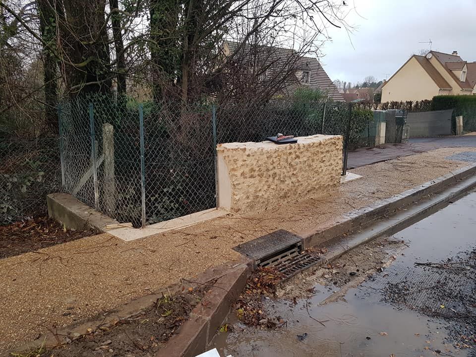 Nos réalisations : une construction en pierre et en métal