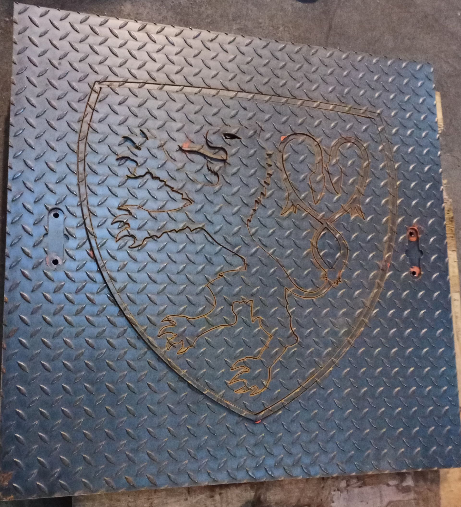 Nos réalisations : découpe au jet d'eau d'un bouclier